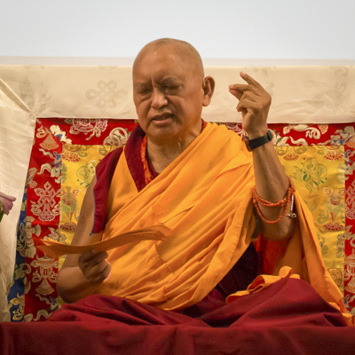 Lama Zopa Rinpoche teaching at Light of the Path rereat, North Carolina, USA, 2014. Photo: Roy Harvey.