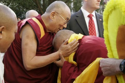 His Holiness the Dalai Lama greets Lama Zopa Rinpoche at Kurukulla Center, Boston, USA, 2012. Photo: Devin Jones.
