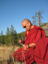 Lama Zopa Rinpoche blessing land in Washington state, USA, 2008. Photo by Holly Ansett.