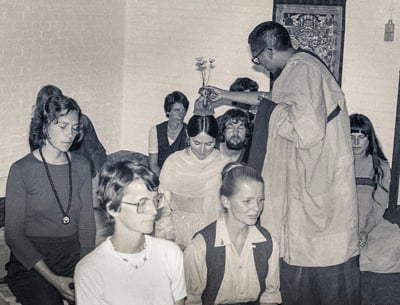 Lama Zopa Rinpoche giving initiation, Maitreya Institute, Bruchem, Netherlands, 1981. Photo: Jan-Paul Kool.
