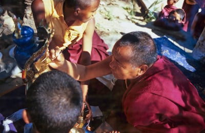 Lama Yeshe painting Tara statue, Kopan Monastery, Nepal, 1976. Photo: Peter Iseli.