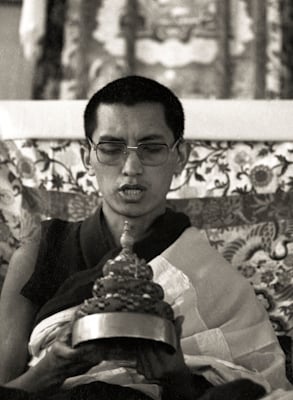 Lama Zopa Rinpoche offering a mandala at the Ninth Meditation Course, Kopan Monastery, Nepal, 1976.