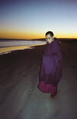 Lama Zopa Rinpoche on the beach in Adelaide, Australia, 1983. Photo: Wendy Finster. 
