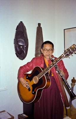 Lama Zopa Rinpoche playing instruments in Adelaide, Australia, 1983. Photo donated by Wendy Finster.