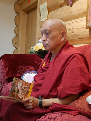 Lama Zopa Rinpoche writing cards at Buddha Amitabha Pure Land, USA, October 2016. Photo: Holly Ansett. 