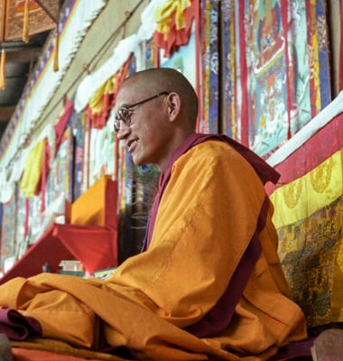 Lama Zopa Rinpoche teaching at the 12th Meditation Course at Kopan Monastery, Nepal, 1979. Photo: Ina Van Delden.