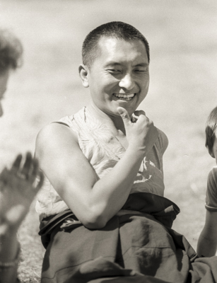 Lama Zopa Rinpoche relaxing at Waterlow Park, Highgate, London, 1983. Photo: Robin Bath.