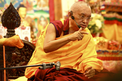 Lama Zopa Rinpoche teaching in Singapore, 2010. Photo: Tan Seow Kheng.