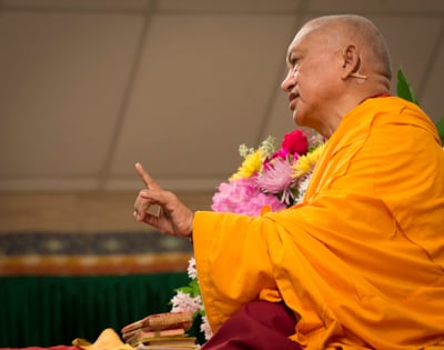 Lama Zopa Rinpoche teaching at the Light of the Path retreat, North Carolina, USA, May 2014. Photo: Roy Harvey.