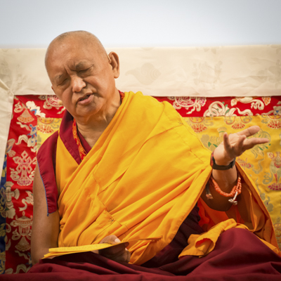 Lama Zopa Rinpoche teaching at Light On the Path retreat in North Carolina, spring 2014. Photo by Roy Harvey.