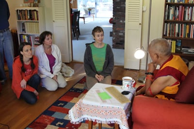 Lama Zopa Rinpoche with Mer Stafford, Jen Barlow and Wendy Cook at LYWA office, Lincoln, MA, October 2012.