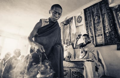 Lama Lhundrup assisting during Lama Zopa Rinpoche&#039;s initiation, Kopan Monastery, Nepal, 1973.