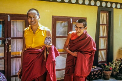 Lama Yeshe and Lama Zopa Rinpoche making Chenrezig tsa tsas on the rooftop terrace at Kopan Monastery, Nepal, 1973.