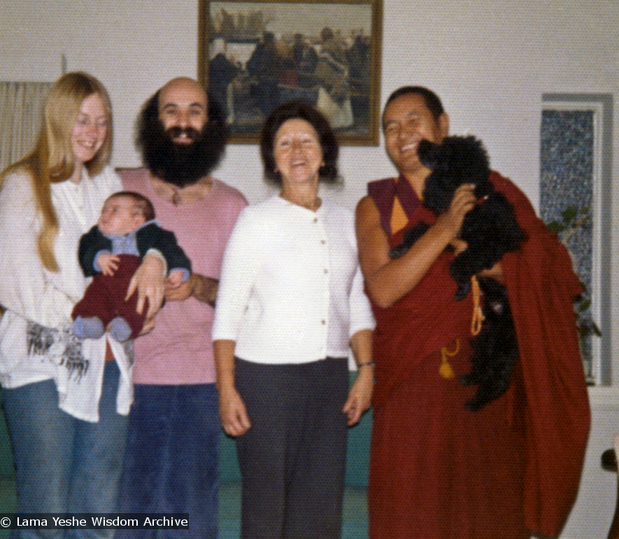 (07645_pr-2.psd) Lama Yeshe with the Ribush family, 1975. From left: Alison Ribush holding Kalu, Dorian Ribush, Beatrice Ribush and Lama Yeshe holding Bobik. Melbourne, Australia, 1975. Photo by Nick Ribush.