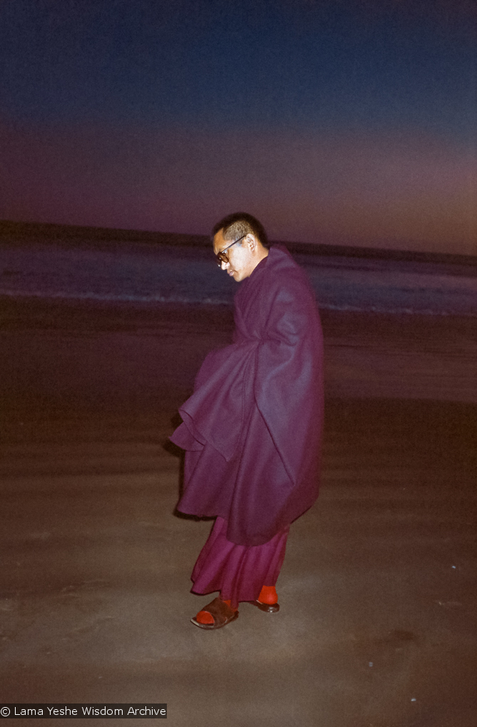 Lama Zopa Rinpoche at the beach, 1983
