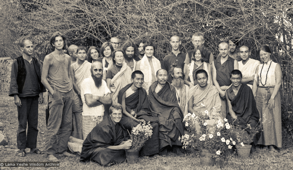 (10259_ng-Edit.psd) Group photo from the first meditation course held at Kopan Monastery, April, 1971. Left to right, front row: Zina Rachevsky, Lama Zopa Rinpoche, Geshe Thubten Tashi, Age Delbanco (Babaji), Lama Yeshe, Gen Wangyal. Fred Von Allmen is at far left, Claudio Cipullo second from the end on the right, and Mark Shaneman is standing directly behind Babaji. Photo provided by Fred von Allmen.
