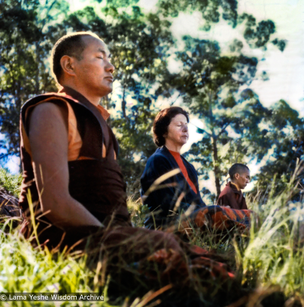 (12039_pr-2.psd) Lama Yeshe, Beatrice Ribush, and Lama Zopa Rinpoche in meditation. On Saka Dawa (the celebration of Buddha&#039;s birth, enlightenment, and death), Lama Yeshe asked everyone to come outside after a Guru Puja for a meditation on the hill behind the gompa. Chenrezig Institute, Australia, May 25, 1975. Photo by Wendy Finster.