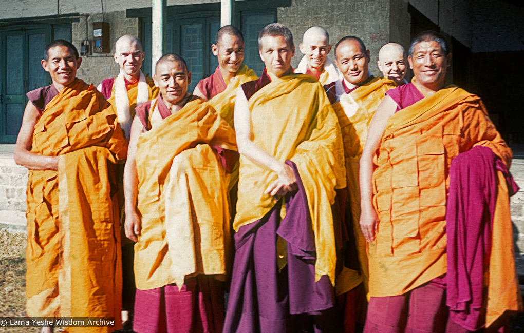 (12509_sl-2.psd) The first ordination of a group of western students, Dharamsala, India, 1970. Zina Rachevsky is in the front row between Gen Jampa Wangdu and Lama Yeshe. Ann McNeil (Anila Ann) is just to the right behind Zina, and Sylvia White is also in the back row to the right of Lama Yeshe.  A student named James is second from left in back row, and Max Mathews who also ordained that day is curiously absent.