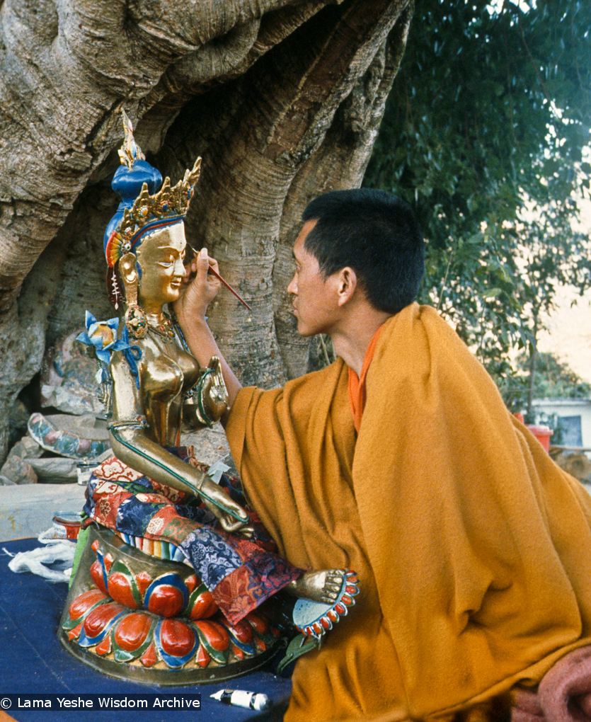 (12906_sl-3.psd) Lama Zopa Rinpoche painting Tara, Kopan Monastery, Nepal, 1976. Lama Yeshe sent Max Mathews to buy a large Tara statue in Kathmandu, which was eventually placed in a glass-fronted house on a pedestal overlooking a triangular pond that was built under the ancient bodhi tree in front of the gompa, Kopan Monastery, Nepal. Photo by Peter Iseli.