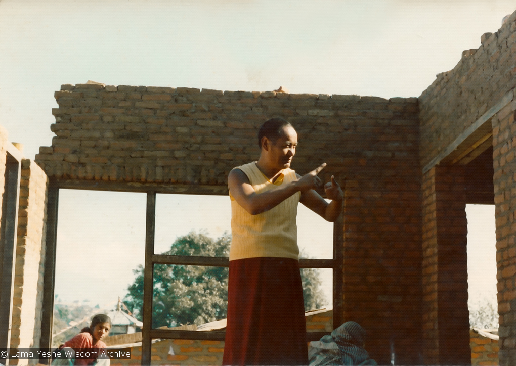 (13533_pr3.psd) Lama Yeshe supervising the construction of an addition above the
kitchen/office complex. Kopan Monastery, Nepal, 1974.