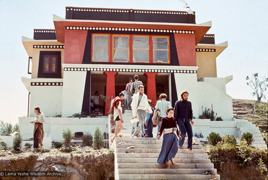 (15167_sl.psd) Front view of Kopan, 1972, with students on the steps. Kopan Monastery, built in Nepal, is the first major teaching center founded by Lama Yeshe and Lama Zopa Rinpoche.