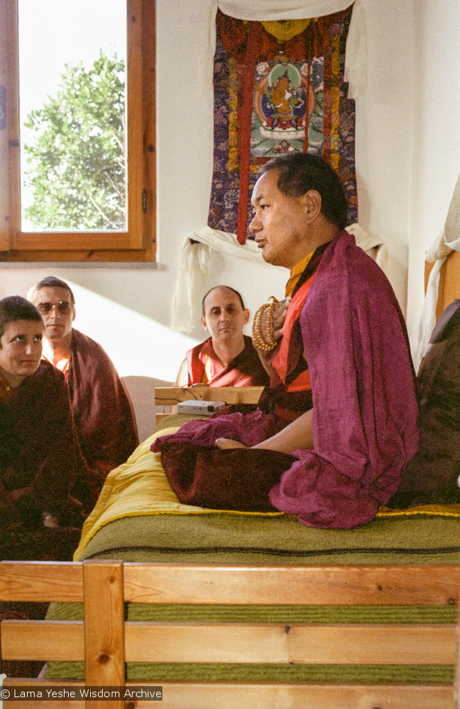 (15235_ng.psd) Lama Yeshe addressing western monks and nuns at Istituto Lama Tsongkhapa, Italy, 1983. Nick Ribush is directly in the center, back wall, Wongmo Thubten (Feather Meston) is in the foreground, left. Photos donated by Merry Colony.