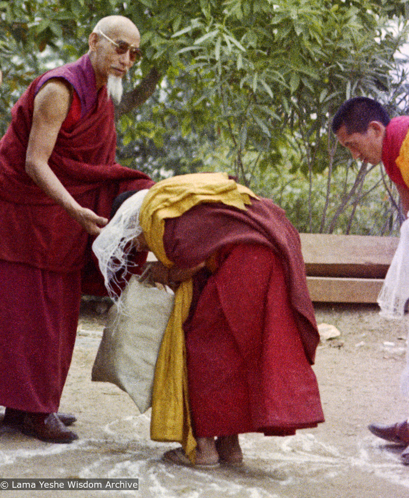(15472_ng-3.psd) In April of 1974, H. H. Zong Rinpoche, a senior lama and teacher for Lama Yeshe, visited Kopan Monastery, Nepal, in time to give teachings during the last week of the Sixth Meditation Course. Lama Yeshe bowing, Lama Zopa Rinpoche is on the far right.