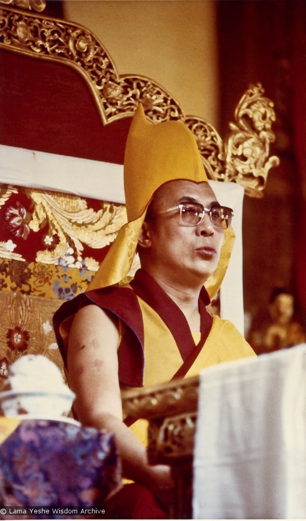 (15609_pr-2.psd) H.H. Dalai Lama giving the Kalachakra empowerment in Bodhgaya, India, 1974. Lama Yeshe and Lama Zopa Rinpoche attended this event with many of their students. Photo donated by Dan Laine, photographer unknown.