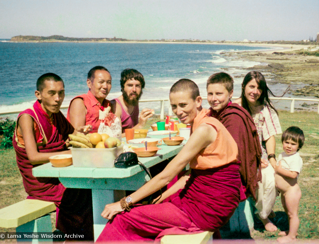 (15853_ng.tif) Group photo by the ocean, Maroochydore, Australia, 1974. The lamas took a day off during the Diamond Valley course to go to the beach in Tom Vichta&#039;s van. Everyone got out to enjoy the view from the cliffs, but Lama Yeshe ran straight down to the water&#039;s edge, hitched up his robes, and waded in, splashing about with delight.