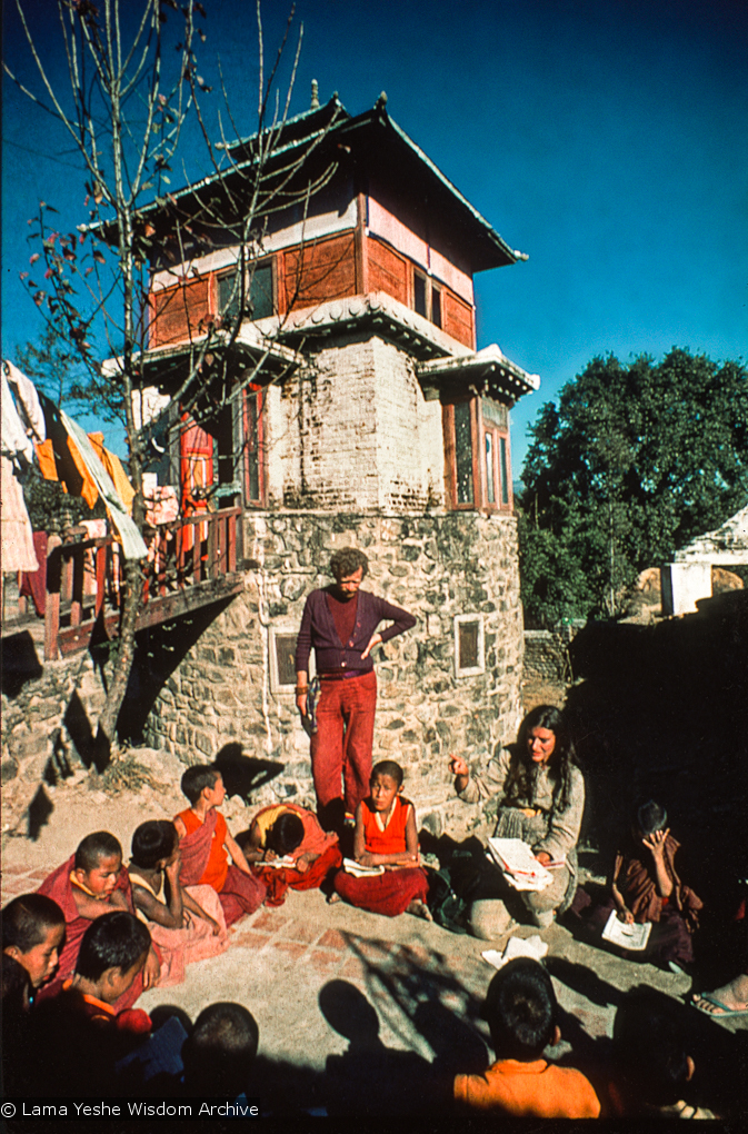 (15866_sl.psd) Westerners teaching the Mount Everest Center students at the foot of Steve&#039;s Tower, possibly 1974. An American student, Steve Malasky (Now Steve Pearl), built a Tibetan tower at one end of the Kopan land which came to be known as &quot;Steve&#039;s Tower&quot;. Kopan Monastery, Nepal, 1974