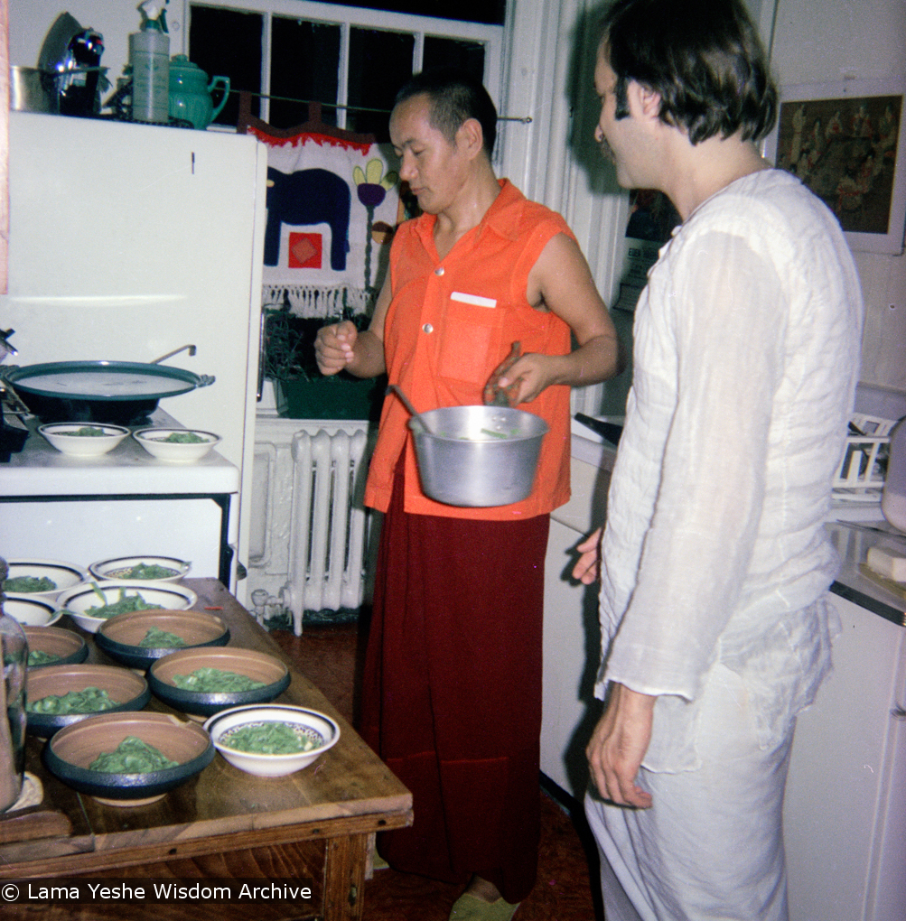 (15892_sl.psd) Lama Yeshe cooking, New York City, 1974. Photo shows Lama and Len Tillem in the kitchen. In July 1974, the lamas and Mummy Max arrived in New York City to begin the first international teaching tour of Lama Yeshe and Lama Zopa Rinpoche. They stayed at the apartment of Lynda Millspaugh on the Upper West side of Manhattan.
