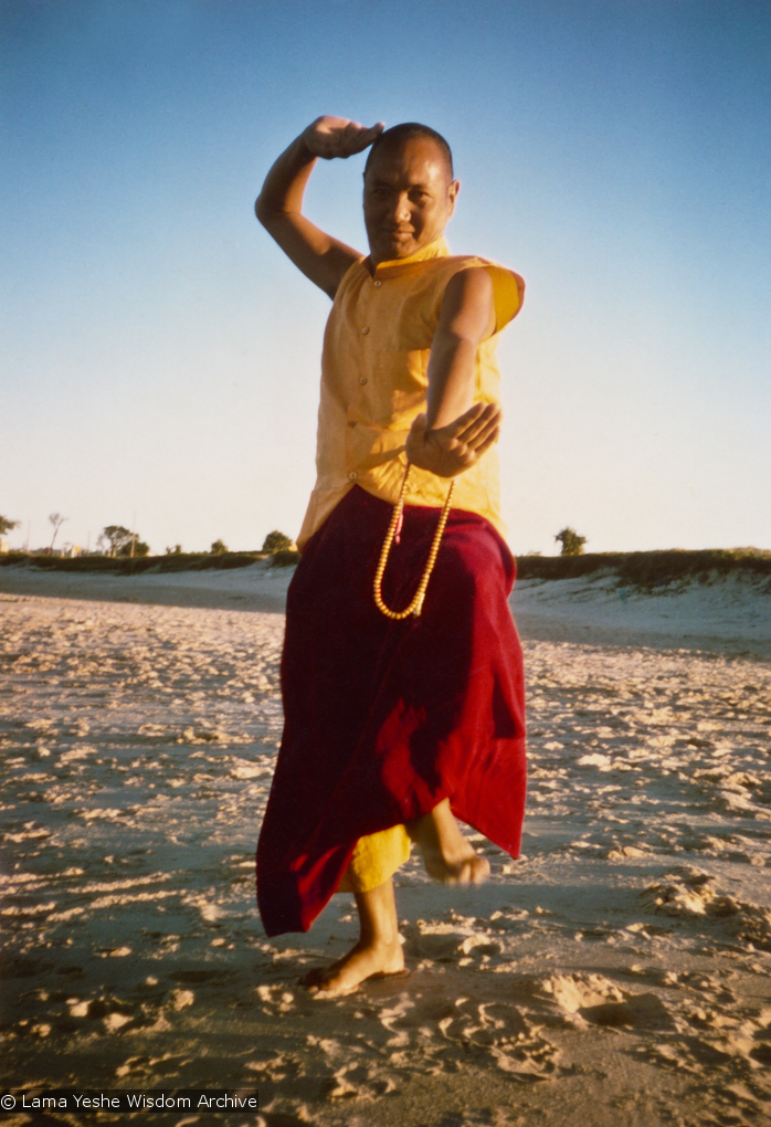 (15929_pr.psd) Lama Yeshe dancing/debating on the beach after the month-long course at Chenrezig Institute, Australia, 1975. Photo by Anila Ann.