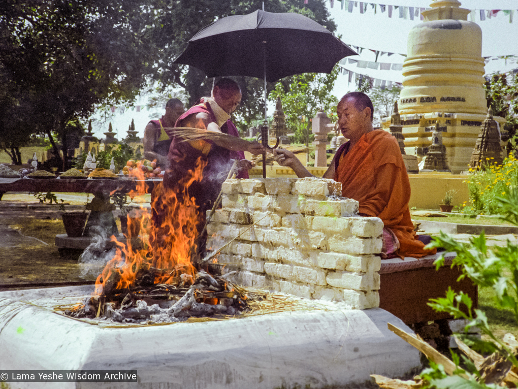 (16253_ng-3.TIF) Lama Yeshe doing fire offering, Bodhgaya, India, 1982. Dan Laine (photographer)