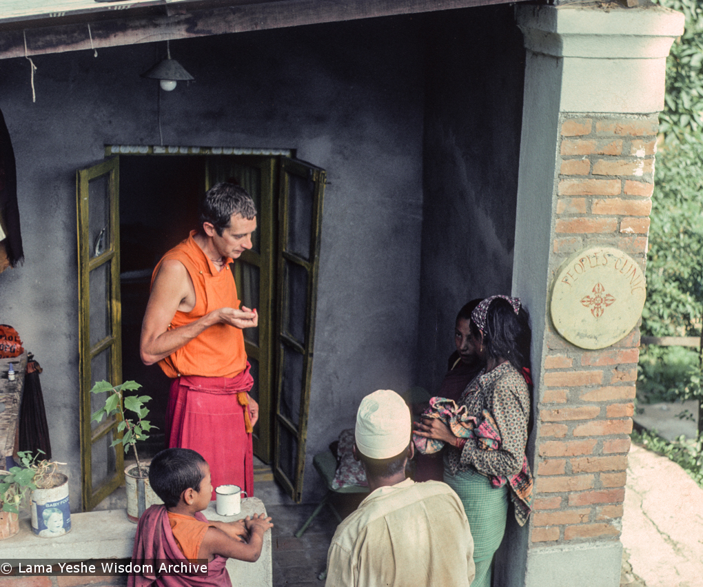 (16688_sl.tif) Adrian Feldmann (Ven Thubten Gyatso) treating local Nepali villagers outside the People&#039;s Clinic, Kopan Monastery, 1979.