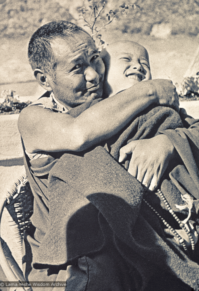 (16745_ng.psd) Lama Yeshe with Yangsi Rinpoche, 1976. Kelsang Puntsog Rinpoche, the son of Lama Yeshe&#039;s old friend Jampa Trinley, was later recognized to be the reincarnation of Geshe Ngawang Gendun, one of Lama&#039;s teachers. In January 1975 he was enthroned at Kopan Monastery, Nepal, after which occasion he became known to all as Yangsi Rinpoche.