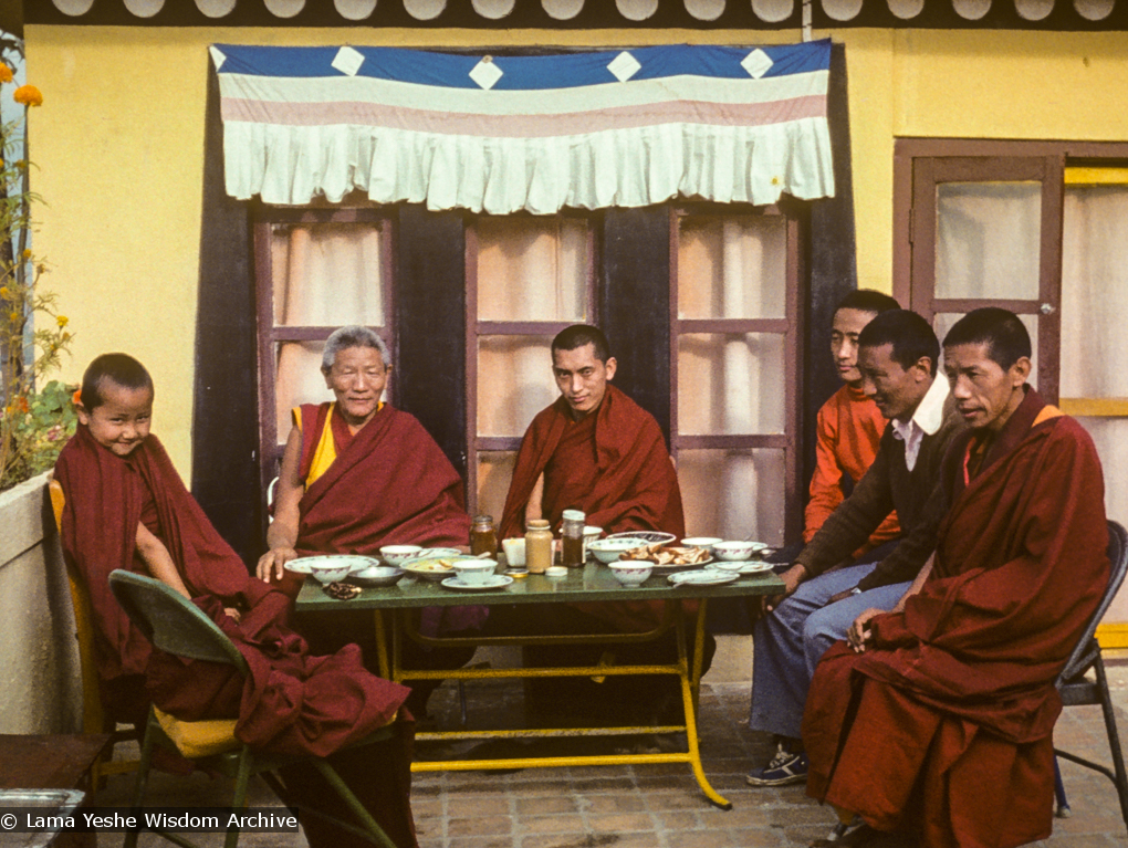 (16749_sl.TIF) Yangsi Rinpoche, Geshe Legden, and Lama Zopa Rinpoche (with Lama Lhundrup at the right) on the  rooftop terrace, Kopan Monastery, Nepal, 1977.Before Yangsi Rinpoche and his brother, Losang Tseten, left Kopan for Sera Monastery, Geshe Ngawang Legden, the Sera Jé abbot, came to visit Kopan with some monastery officials in order to thank Lama for his large donation to the Assembly Hall fund.