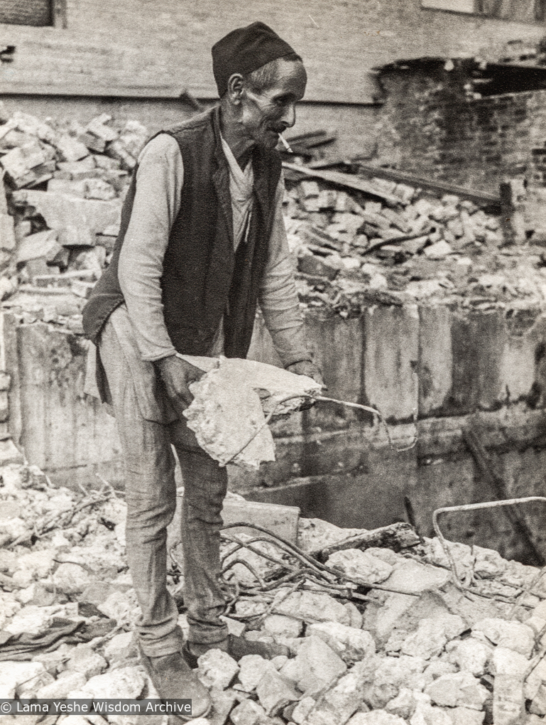 (21881_pr-3.tif) Chowkidhar fixing the exploded septic tank, Kopan Monastery, 1977