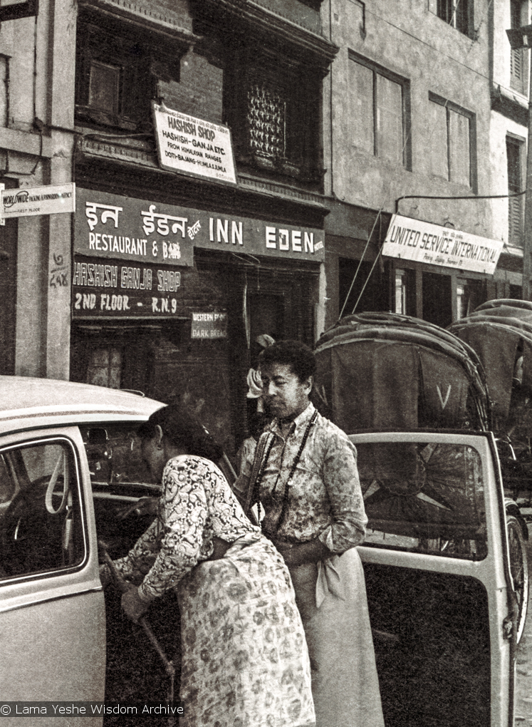 (15071_ng-2.psd) Max Mathews and her Volkswagen outside Eden Hash Shop in Kathmandu, Nepal, 1970. Another nearby hot spot was a cafe called The Blue Tibetan where Lama Yeshe sometimes went for tea and to practice his hippie English.