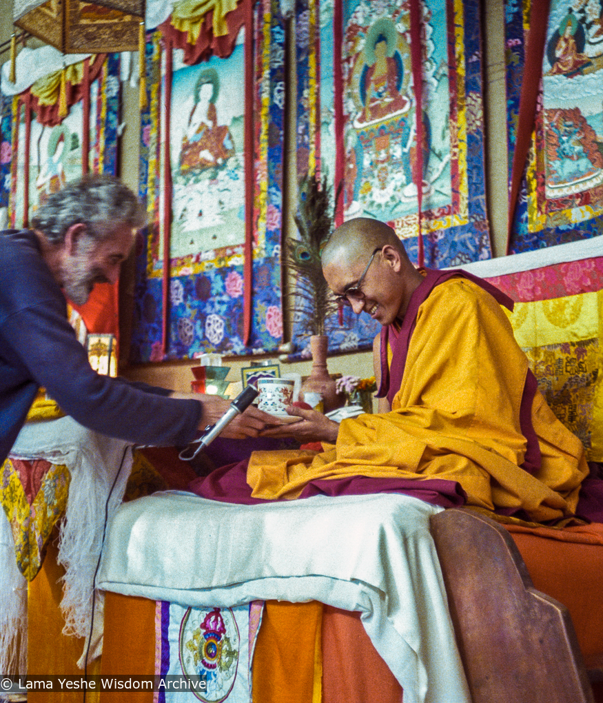 (22842_ng-3.psd) John Schwartz attending to Lama Zopa Rinpoche, 12th Meditation Course, Kopan Monastery, Nepal, 1979. Ina Van Delden (photographer)