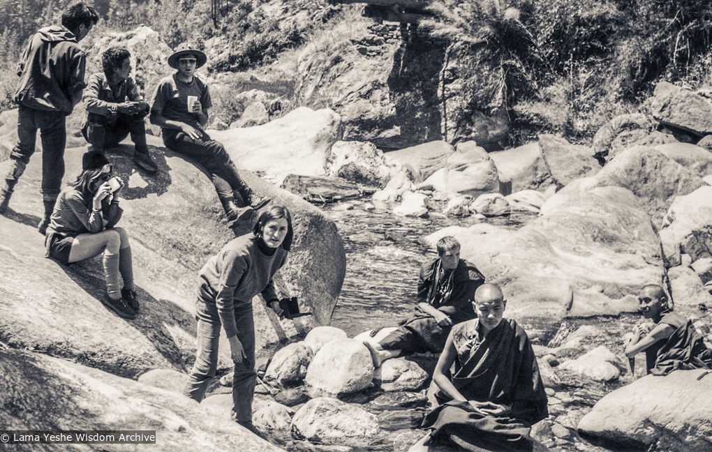 (34018_ud-1.psd) The treking party stops by a river in Kusum on the way to Phagding (half way between Lukla and Namche in Nepal). The party included Lama Yeshe, Lama Zopa Rinpoche, Max Mathews, Zina Rachevsky, Jacqueline Fagan (a New Zealander who had been at Villa Altomont), Judy Weitzner and her husband, Chip Cobalt. Photo donated by Judy Weitzner.