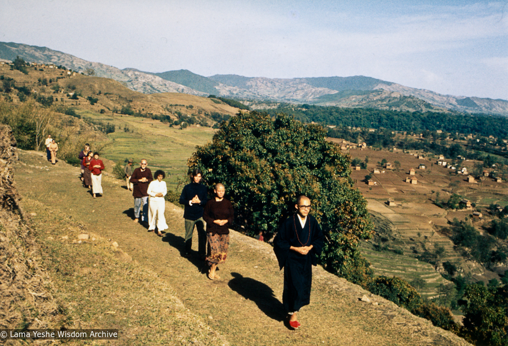 (39232_pr-3.jpg) Zengo leading walking meditation on Kopan Hill, Kopan Monastery, Nepal, 1971.