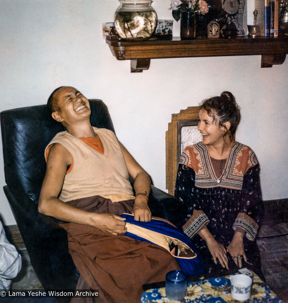 (39289_pr-3.psd) Lama Yeshe and Gabe Wallace, Melbourne, 1974.  Gabe Wallace (donor). Pete Northend: “I walked into our small flat and it was really crowded. Bea Ribush was there and Colin Crosbie, Pete and Gabe. It’s a very small flat and you couldn’t overlook anybody. So I stood there with the flagon under my arm while they all looked at me and packed up laughing. What I didn’t know was that Lama Yeshe was sitting right beside me with his zen pulled over his face. Somehow that had made him invisible to me. Then he whipped it off. I couldn’t believe he was there.&quot;
