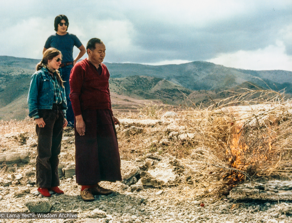 (39468_pr-3.tif) Lama Yeshe doing puja with Paula Chichester and LaNada Boyer (Warjack) at Pyramid Lake after the Grizzly Lodge Course, 1980. Carol Fields (donor)