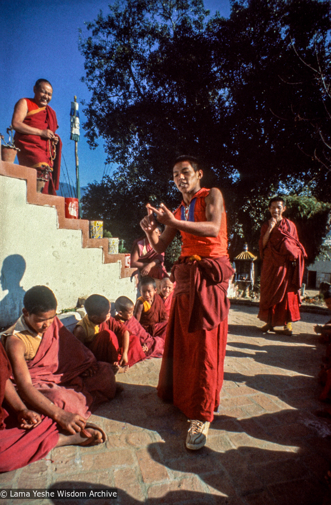 Thubten Sherab debating; lamas look on, Kopan, 1979