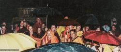 (06965_pr-3.psd) Lamas with sangha and students doing puja in the rain, Bodhgaya, India, 1982.