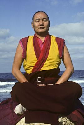 Lama Yeshe meditating by the ocean, Sicily, 1983. Photo: Jacie Keeley.