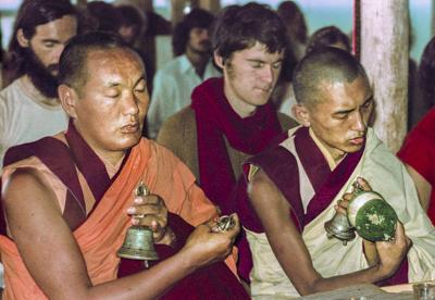 Lama Yeshe and Lama Zopa Rinpoche doing puja with students at Chenrezig Institute, Australia, May 1975. 