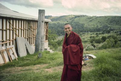 Lama Zopa Rinpoche outside the new gompa, Chenrezig Institute, Australia, 1975.