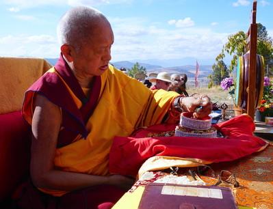 Rinpoche offering a mandala at Buddha Amitabha Pure Land, USA, October 2016. Photo: Lobsang Sherab. 