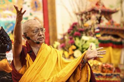 Lama Zopa Rinpoche teaching in Singapore, 2010. Photo: Tan Seow Kheng.